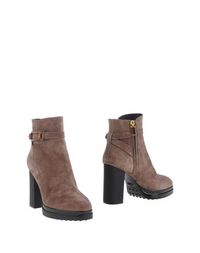 Полусапоги и высокие ботинки Tods