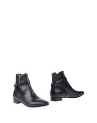 Полусапоги и высокие ботинки Prada