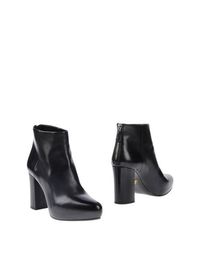 Полусапоги и высокие ботинки Prada