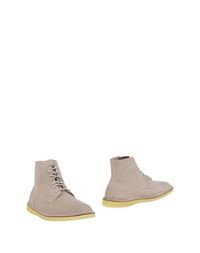 Полусапоги и высокие ботинки Clarks