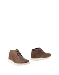 Полусапоги и высокие ботинки Timberland
