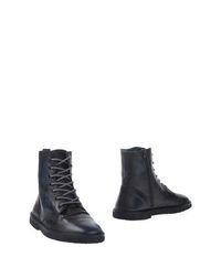 Полусапоги и высокие ботинки Golden Goose