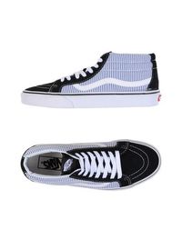 Высокие кеды и кроссовки Vans