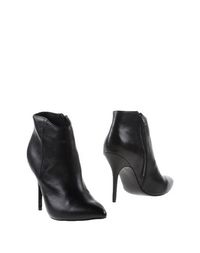 Полусапоги и высокие ботинки Steve Madden