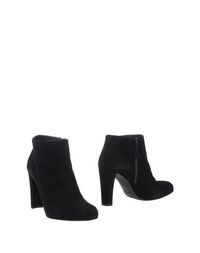 Полусапоги и высокие ботинки Stuart Weitzman