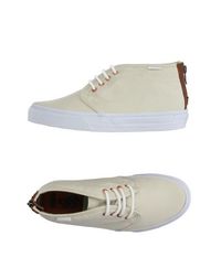 Высокие кеды и кроссовки Vans