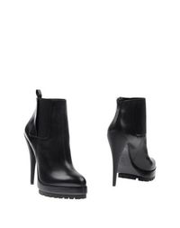 Полусапоги и высокие ботинки Casadei