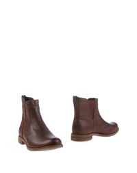 Полусапоги и высокие ботинки Timberland