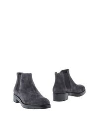 Полусапоги и высокие ботинки Tods