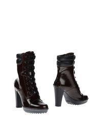 Полусапоги и высокие ботинки Tods