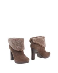 Полусапоги и высокие ботинки UGG Australia