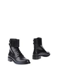 Полусапоги и высокие ботинки Saint Laurent