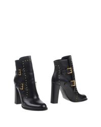 Полусапоги и высокие ботинки Alexander Mcqueen