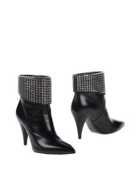 Полусапоги и высокие ботинки Saint Laurent