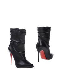 Полусапоги и высокие ботинки Christian Louboutin