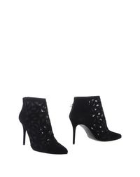 Полусапоги и высокие ботинки Stuart Weitzman