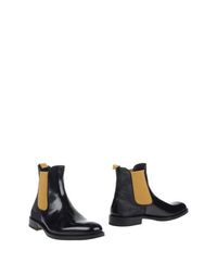 Полусапоги и высокие ботинки Pollini