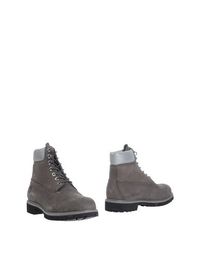 Полусапоги и высокие ботинки Timberland