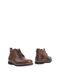 Полусапоги и высокие ботинки Timberland