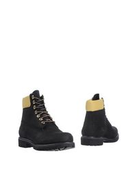 Полусапоги и высокие ботинки Timberland