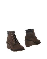 Полусапоги и высокие ботинки Timberland