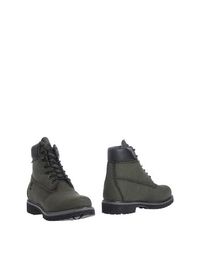 Полусапоги и высокие ботинки Timberland