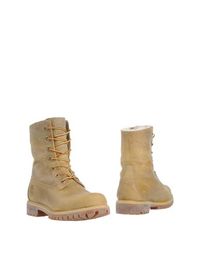 Полусапоги и высокие ботинки Timberland