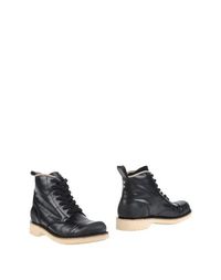 Полусапоги и высокие ботинки Diesel