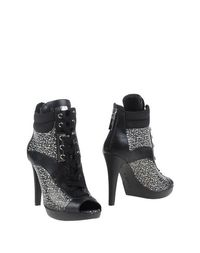 Полусапоги и высокие ботинки Guess