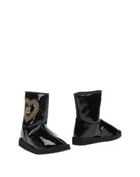 Полусапоги и высокие ботинки Love Moschino