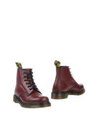 Полусапоги и высокие ботинки DR. Martens