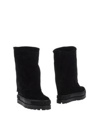 Полусапоги и высокие ботинки Casadei