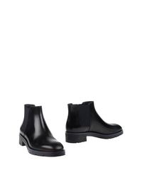 Полусапоги и высокие ботинки Tods