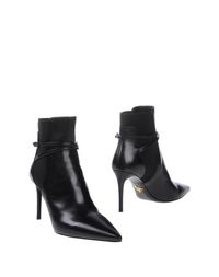 Полусапоги и высокие ботинки Prada