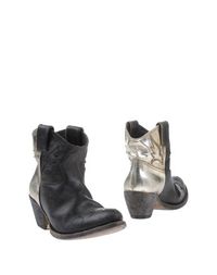Полусапоги и высокие ботинки Golden Goose