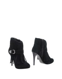 Полусапоги и высокие ботинки Guess