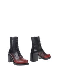 Полусапоги и высокие ботинки MIU MIU