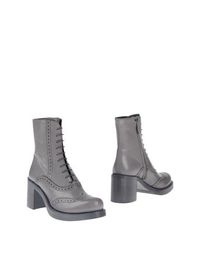 Полусапоги и высокие ботинки MIU MIU