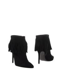 Полусапоги и высокие ботинки Stuart Weitzman