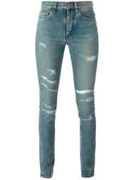 джинсы кроя скинни  с рваными деталями   Saint Laurent