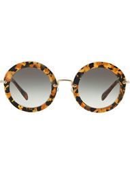 солнцезащитные очки в круглой оправе Miu Miu Eyewear