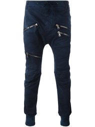 джинсы с заниженной проймой и отделкой молниями Pierre Balmain