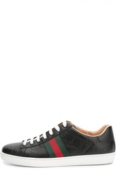 Кожаные кеды с тиснением и эластичной лентой Gucci