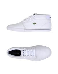 Высокие кеды и кроссовки Lacoste