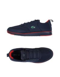 Низкие кеды и кроссовки Lacoste