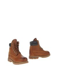 Полусапоги и высокие ботинки Timberland