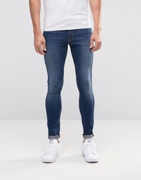 Темные супероблегающие джинсы ASOS - Синий