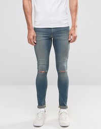 Супероблегающие джинсы с дырками на коленях ASOS - Синий