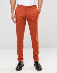 Красно-бурые супероблегающие брюки в строгом стиле ASOS - Красный