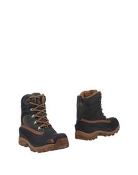 Полусапоги и высокие ботинки THE North Face